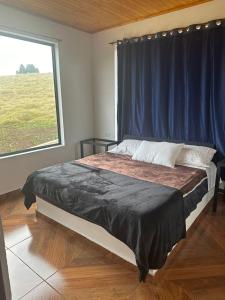 Postel nebo postele na pokoji v ubytování Finca Siberia, Sisga