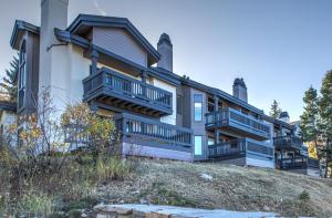 a house with balconies on the side of a hill at K B M Resorts NEW LISTING Ski Access to Deer Valley slopes Common Hot Tub Parking in Silver Lake Deer Valley in Park City