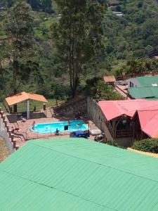 Vista de la piscina de Hotel Campestre Mirador De San Nicolas o alrededores