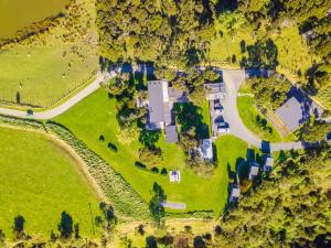 an aerial view of a park with trees and a road at Lansdowne Farm Lodge in Hawkeswood