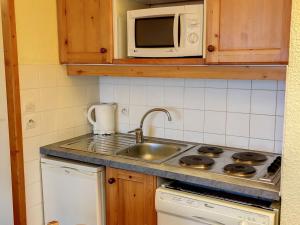 Η κουζίνα ή μικρή κουζίνα στο Appartement Les Arcs 1800, 3 pièces, 6 personnes - FR-1-346-571
