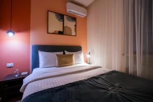 Letto o letti in una camera di The House Hotel Yerevan
