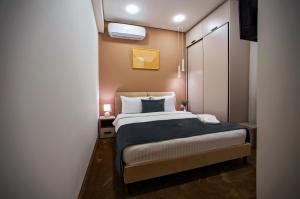 Letto o letti in una camera di The House Hotel Yerevan