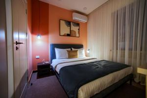 Letto o letti in una camera di The House Hotel Yerevan