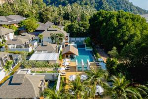 an aerial view of a resort with a swimming pool at Bhu Nga Thani Resort & Villas Railay in Railay Beach
