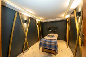 Postel nebo postele na pokoji v ubytování The Byzantium Suites Hotel & Spa