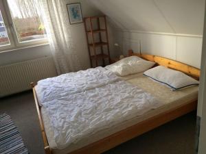 Letto o letti in una camera di Holiday home Watersnip 5
