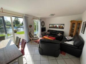 Area soggiorno di Holiday home Watersnip 5