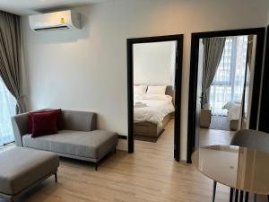 Ένα ή περισσότερα κρεβάτια σε δωμάτιο στο EDGE Central Pattaya