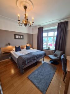 Postel nebo postele na pokoji v ubytování Hamnhotellet Kronan