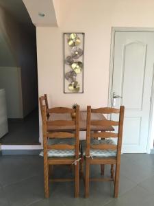 Posezení v ubytování Appartement climatisé 1 à 4 personnes avec belle terrasse
