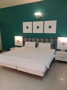 Postel nebo postele na pokoji v ubytování Hotel Airlines