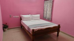 מיטה או מיטות בחדר ב-Villa Cherie