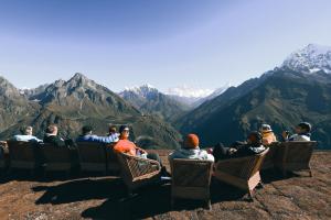 a group of people sitting on chairs on top of a mountain at Mountain Lodges of Nepal - Kongde in Kongde +11 photos