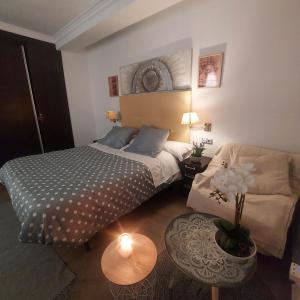 Posteľ alebo postele v izbe v ubytovaní Alojamiento para dos con bañera hidromasaje