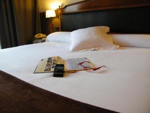 Łóżko lub łóżka w pokoju w obiekcie Oca Ipanema Hotel