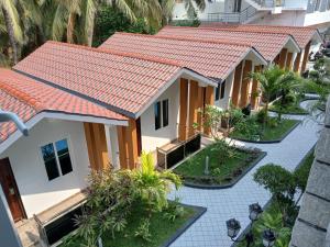 an aerial view of a house with an orange roof at Ramraj Resort in Kanyakumari
