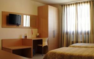 TV a/nebo společenská místnost v ubytování Hotel Ristorante Cigno - Camere and Aparthotel