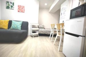 O bucătărie sau chicinetă la XL Shinjuku House