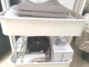Un pat sau paturi într-o cameră la XL Shinjuku House