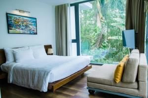 Postel nebo postele na pokoji v ubytování FLAMIGO Đại Lải - Villa Tự Doanh + 167 fotografií
