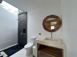 Koupelna v ubytování Padi-Padi Pool Villas