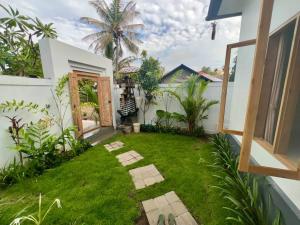 Zahrada ubytování Padi-Padi Pool Villas