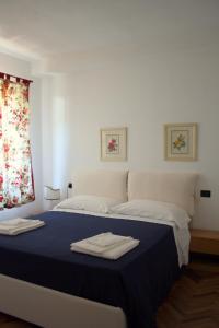 Postel nebo postele na pokoji v ubytování Hibiscus B&B