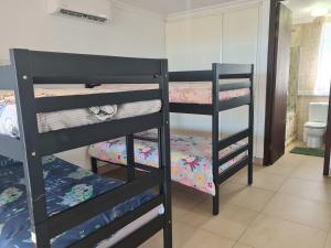Santorini A-Block Penthouse客房内的一张或多张床位