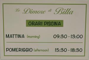 two signs with the names of three different languages at Le dimore di Billa in Martella