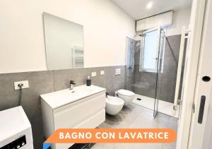 a bathroom with a sink and a toilet and a shower at Federica's house Rimini [150 mt dal mare] in Rimini