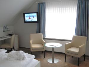 TV o dispositivi per l'intrattenimento presso Frühstückshotel Seemannsbraut Amrum-adults only ab 18 Jahre-keine Haustiere-
