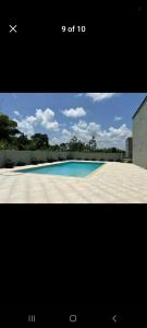 a picture of an empty swimming pool with at Serenity Condo in Piarco