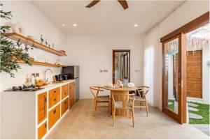 Kuchyň nebo kuchyňský kout v ubytování Empat by Aayan