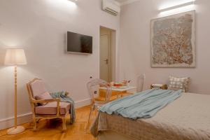 Posteľ alebo postele v izbe v ubytovaní Accanto Al Centro B&B
