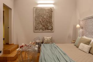 Posteľ alebo postele v izbe v ubytovaní Accanto Al Centro B&B