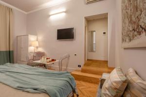 Posteľ alebo postele v izbe v ubytovaní Accanto Al Centro B&B