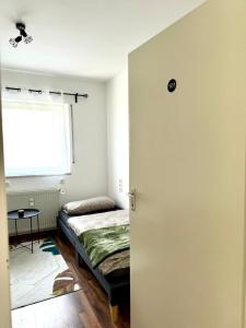 Postel nebo postele na pokoji v ubytování Main Weindorf Unterkunft