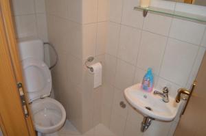 Kúpeľňa v ubytovaní Apartment Quattro + 36 fotografií