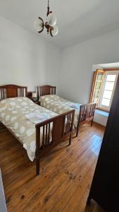 Postel nebo postele na pokoji v ubytování Casa Ines