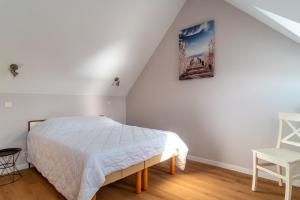 Postel nebo postele na pokoji v ubytování Les Glénans - Duplex vue mer proche plage