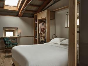 Postel nebo postele na pokoji v ubytování Domus Blanc Boutique Hotel