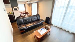 Posezení v ubytování Apartment Hotel Ecott