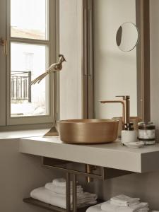 Koupelna v ubytování Domus Blanc Boutique Hotel