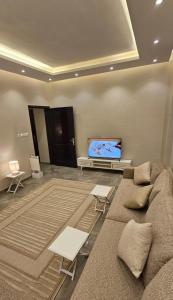 Et tv og/eller underholdning på شقة عائلية ثلاث غرف نوم