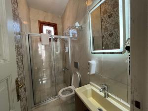Koupelna v ubytování Le Safran Suite Hotel