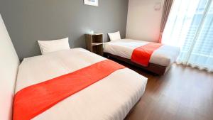 Postel nebo postele na pokoji v ubytování Apartment Hotel Ecott