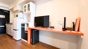 Kuchyň nebo kuchyňský kout v ubytování Apartment Hotel Ecott