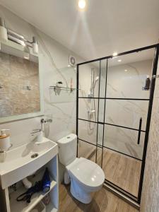 Koupelna v ubytování Dreilini Residence + 10 fotografií