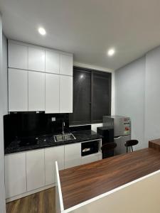 Kuchyň nebo kuchyňský kout v ubytování Happy House + 6 fotografií
